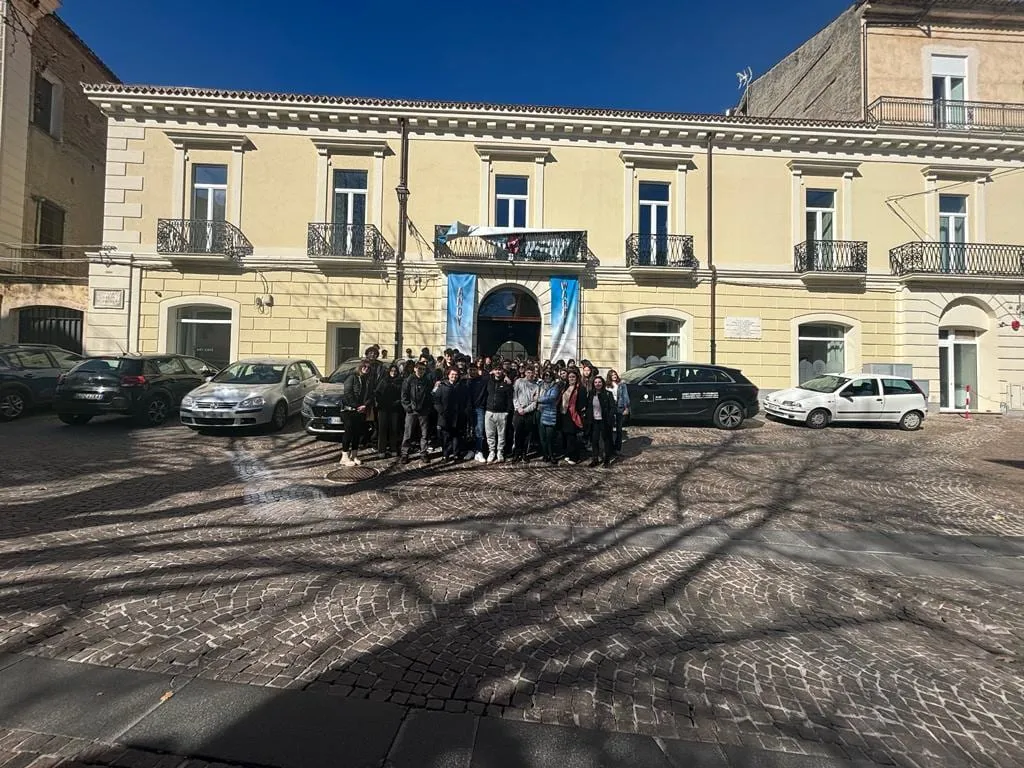 La facciata di Palazzo Greco Stella con gli stendardi della mostra